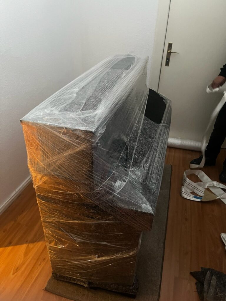 Klaviertransport Berlin sicher verpacktes Digitalpiano Umzug